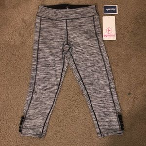 cropped leggings , with the tags sill on it :)